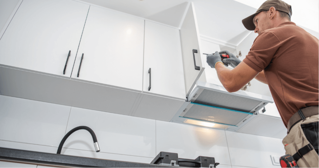 General Contractor installing cabinets - Why You Should Hire a General Contractor